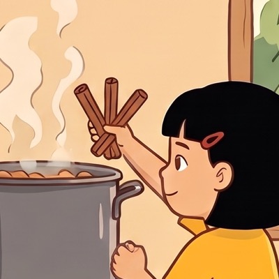 Linh holding three sticks of cinnamon over the pot